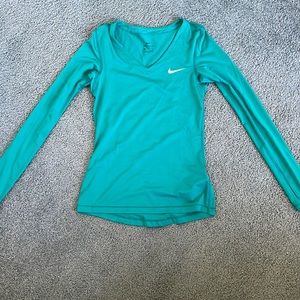 Green Nike athletic shirt